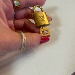Louis Vuitton Gold Padlock with Key